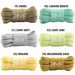 May include: Six different colors of shoelaces, each rolled up and tied in a knot. The colors are khaki, lagoon breeze, light grey, light jade, mellow, and millennium gold.