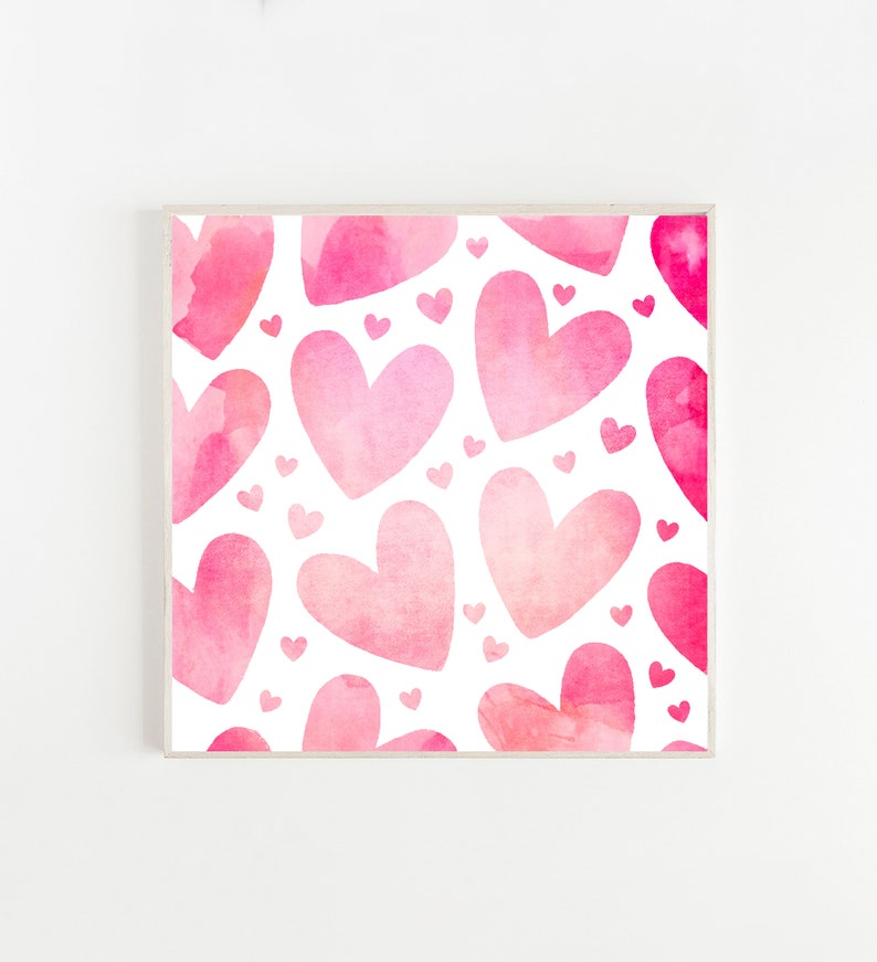 May include: A white background with a pattern of pink watercolour hearts of different sizes. The hearts are layered on top of each other, creating a sense of depth and dimension.