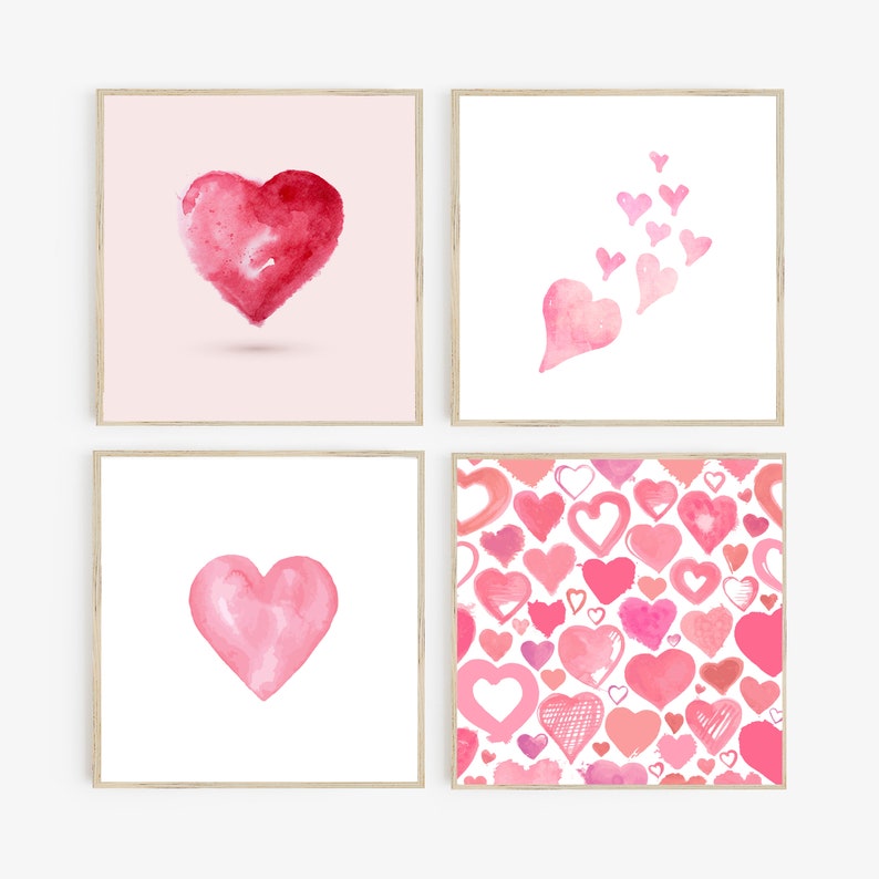 May include: Set of four watercolor heart prints in pink and red. The prints feature a single large heart, a cluster of small hearts, and a pattern of hearts.