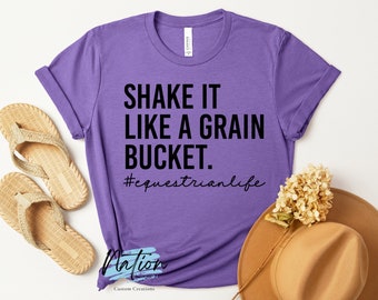 Shake It Like A Grain Bucket T-Shirt, #Equestrian Life, horses, cowboy, grain, cowgirl, horse life, taking care of horses
