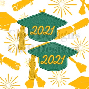 May include: Two green graduation caps with gold tassels and the year 2021 embroidered in gold on each cap. The caps are on a white background with yellow stars and graduation caps.