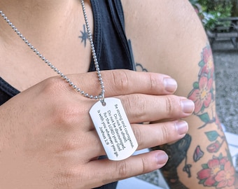 May include: A silver necklace with a dog tag pendant that reads "Be strong and courageous. Do not be afraid; Do not be discouraged, for the LORD your God is with you wherever you go. Joshua 1:9"