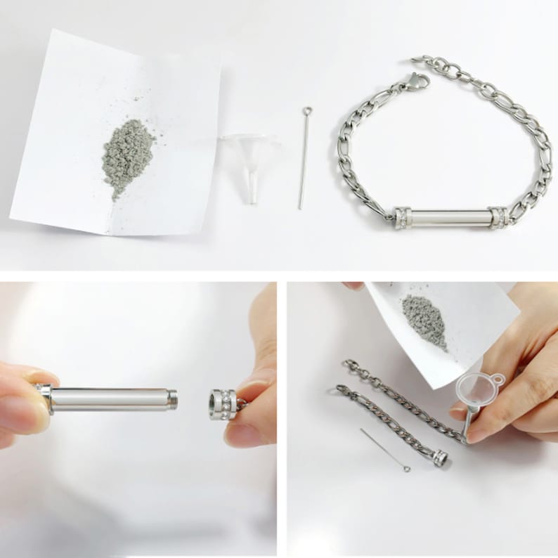 May include: A silver bracelet with a small, cylindrical container attached. The container is open and a small funnel and a metal tool are nearby. A small pile of gray powder is on a white piece of paper.