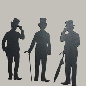 May include: Three black silhouette figures of people wearing top hats and suits. The figures are standing with their arms at their sides. The figure on the left is holding a hat in their hand. The figure in the middle is holding a walking stick. The figure on the right is holding an umbrella.
