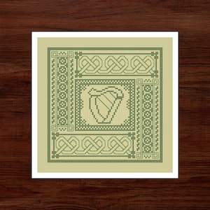 May include: A cross-stitch pattern featuring a green Celtic harp surrounded by a green Celtic knot border on a beige background.