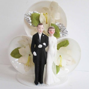 Wedding Cake Topper with Bride and Groom, Three Bells, Cloth Flowers, and Good Luck Horseshoes Hard Plastic 1940s