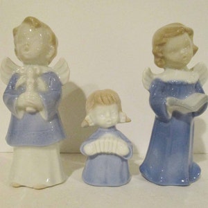 Made in Japan Two Blue and White Ceramic Angels Singing with a Child Playing the Concertina 1950s