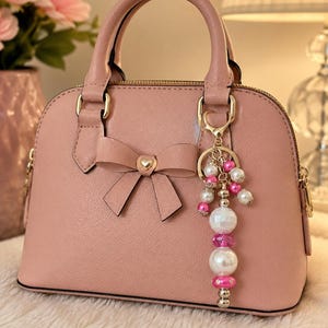 Portachiavi con ciondolo a forma di fiore rosa per borsa primaverile