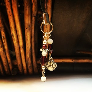 Phone/purse charm or scissor fob with garnet beads and puppy / dog paw silver-tone charm