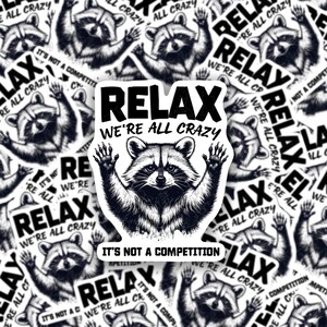May include: A black and white sticker with a raccoon illustration and the text "Relax We're All Crazy It's Not A Competition".