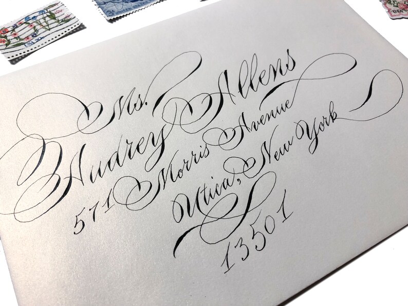 Gala script Pearl blonde gold metallic envelopes with black ink in art nouveau script Fancy custom wedding stationary unique fun