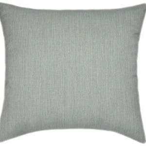 May include: A light blue square throw pillow with a subtle textured fabric.