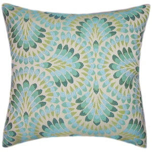 May include: Square decorative pillow with a repeating pattern of stylized teal, light blue, and green feather-like shapes on a cream background. The pillow has a textured appearance and is likely made of fabric.