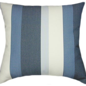 May include: A blue and white striped throw pillow with a soft, textured fabric. The pillow is rectangular and has a subtle sheen.
