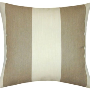 May include: A beige and white striped throw pillow with a square shape.
