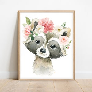 May include: A watercolor painting of a raccoon wearing a flower crown. The raccoon has a pink nose and black eyes. The flowers in the crown are pink, white, and green.
