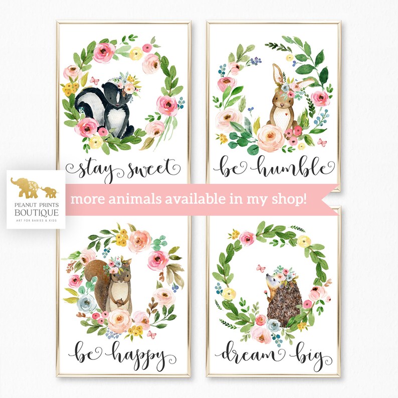 May include: Set of four watercolor prints featuring floral wreaths with different animals in the center. Each print has a different inspirational quote: "stay sweet", "be humble", "be happy", and "dream big".
