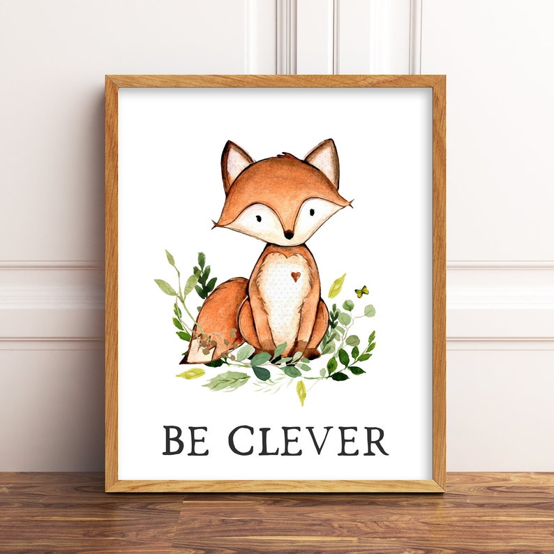 May include: A watercolor illustration of a fox sitting on a bed of green leaves with the text "BE CLEVER" below it.