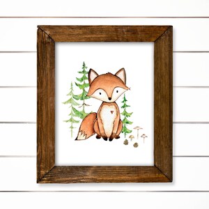 May include: A watercolor painting of a fox in a forest setting. The fox is brown and white with a red heart on its chest. The fox is surrounded by green trees and brown mushrooms.