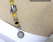 The Patsy Stone Ab Fab beaded strap for one shoulder, strapless and off shoulder top or dress
