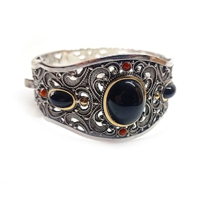 Unique Bracelet made of Sterling Silver, Jet Stone, Gold And Coral