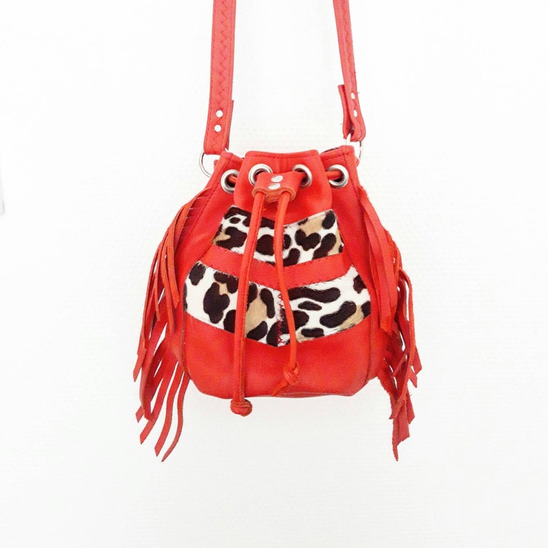 Red and leopard calfskin leather bucketbag. image 1