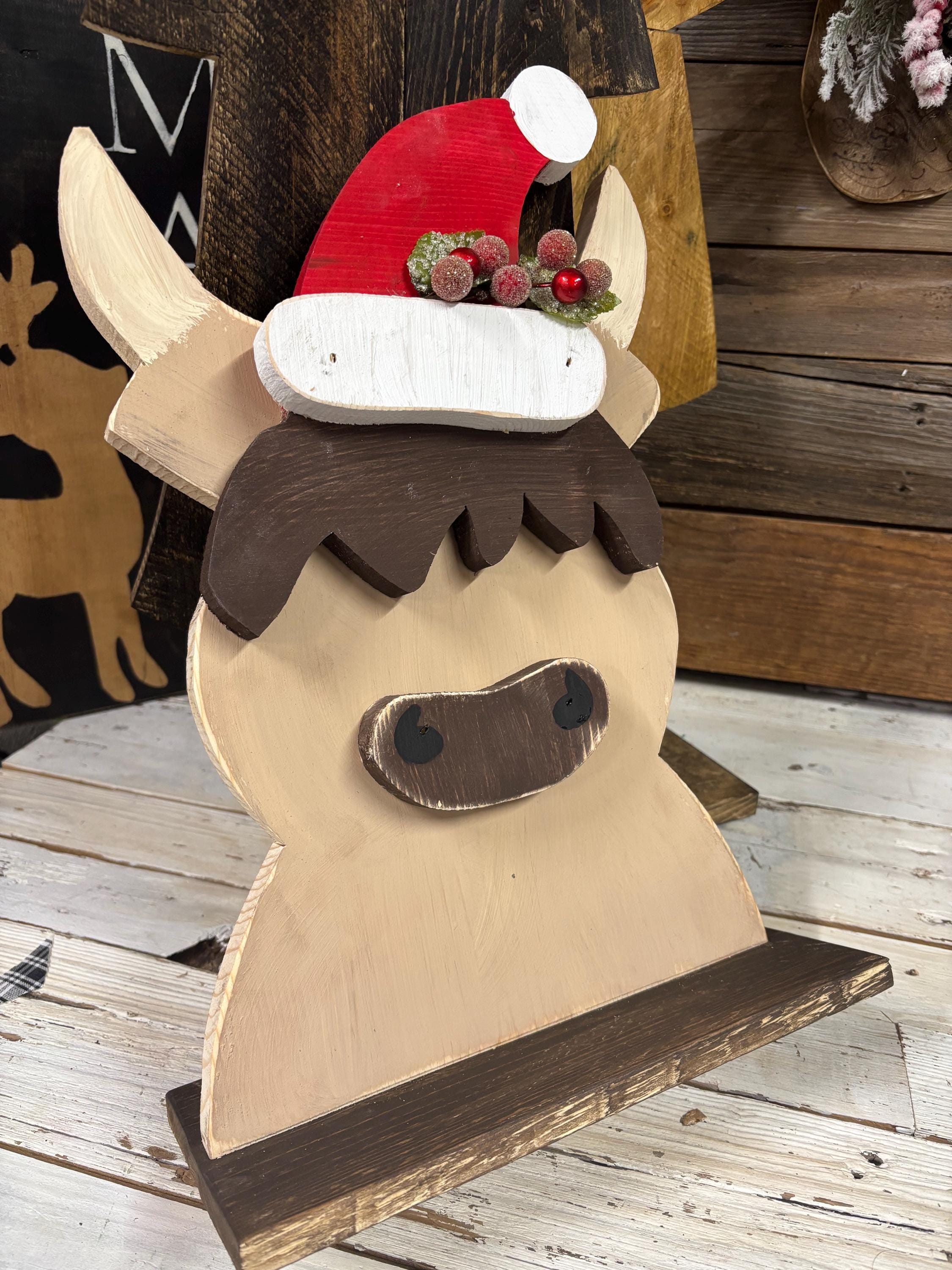 40 Festive Christmas Kitchen Decor Ideas to Spice Up Your Home: Jolly Touches for a Merry Cooking Space 21 HIGHLAND COW with Santa Hat Western wood country sign, cow, cowboy…