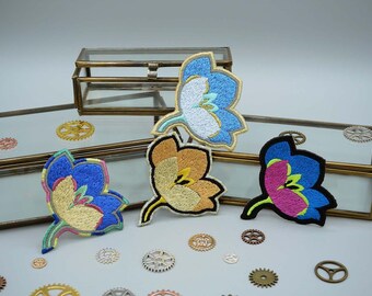 Embroidered iron on or sewable patch "Clematis" - Ideal for clothes, jeans or bags ("Flashy Contrast" shades)