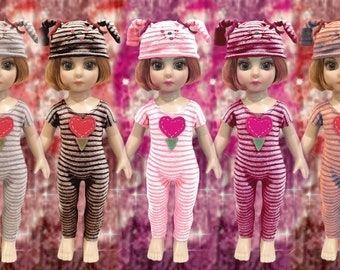 May include: Five dolls wearing striped pajamas with a heart-shaped patch and matching cat-eared hats in various colors, including pink, brown, gray, and orange.