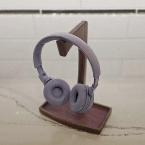 Soporte para auriculares: soporte para colocar sobre la oreja y exhibirlos. Accesorio de escritorio para gamers, creadores y amantes de la música.