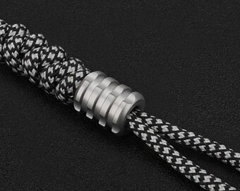 Meskralen van titaniumlegering Paracord Paraplu Touwkoord Outdoor EDC-hangerkraal