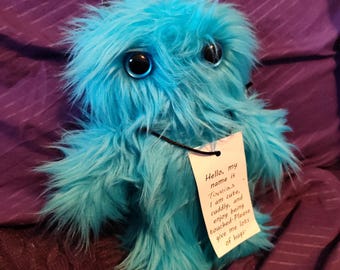 Tomias, Peluche de monstruo adorable con pelaje azul desgreñado, 2 cuernos de fieltro y 2 ojos de seguridad azul oscuro metálicos pintados a mano, hecho a mano,