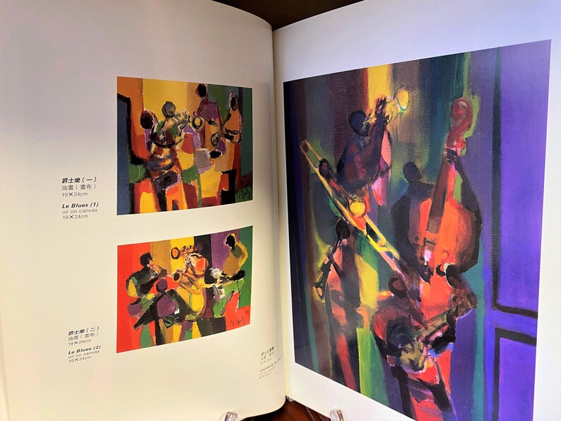 May include: Two paintings of jazz musicians playing instruments. The first painting is a close-up of a group of musicians playing in a colorful, abstract style. The second painting shows a group of musicians playing in a more realistic style, with a focus on the trombone and cello.