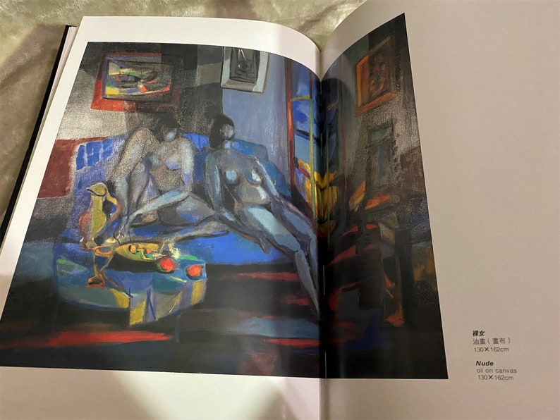 May include: A painting of two nude figures reclining on a blue couch. The figures are painted in a stylized, abstract style with muted colors. The painting is set in a room with a window and other furniture.