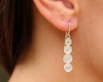 "Linea panderos" watermark earrings