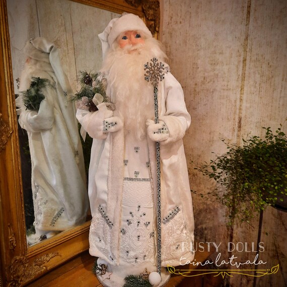 santa dressed in white Ultra Wig and Beard Set shirt and cape is one size fits most male adults which can be seen below Silver White Santa Claus -