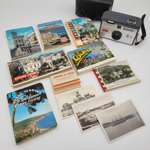 Vintage travel postcard books and Kodak instamatic camera bundle