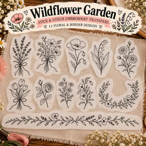 May include: A set of eleven stick and stitch embroidery transfers titled Wildflower Garden, featuring black line art illustrations of various floral bouquets, individual flowers, and a long botanical border design on white adhesive paper.