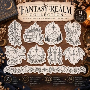 May include: A set of nine white stick and stitch embroidery transfers featuring black line art designs including a sword, a crown on books, mountains, a deer, a dragon, and floral motifs with the text FANTASY REALM COLLECTION.