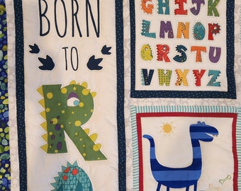 Custom handmade baby nursery dinosaur quilt