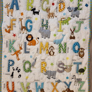 Custom handmade baby nursery quilt Alphabets.