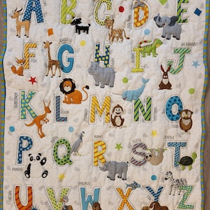 Custom handmade baby nursery quilt Alphabets.