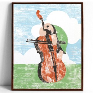 An art print of a musical tortoise playing an orange cello in a field of green grass as white clouds float over a baby blue sky
