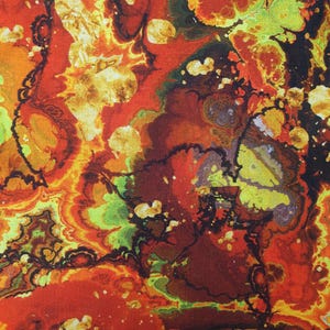 May include: A piece of fabric featuring a vibrant, abstract marbled pattern with swirling colors of deep red, bright orange, lime green, and dark brown. The design resembles fluid paint with organic, cloud-like shapes and intricate dark outlines.
