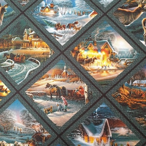 May include: A patterned fabric featuring a repeating diamond grid design. Each diamond contains a detailed winter scene with snow-covered houses, horse-drawn sleighs, people, and animals, all rendered in shades of blue, white, and warm orange.