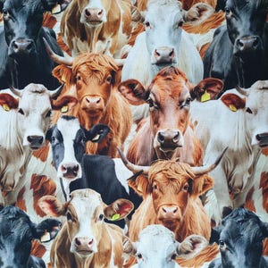 May include: A fabric pattern featuring a collage of cow faces in various colors, including black, white, brown, and tan. Some cows have horns, and all are facing forward. The pattern is densely packed with the cow faces.
