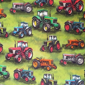 May include: A fabric pattern featuring a repeating design of colorful tractors on a green background. The tractors are in various colors, including red, green, blue, and orange, with black and red wheels.