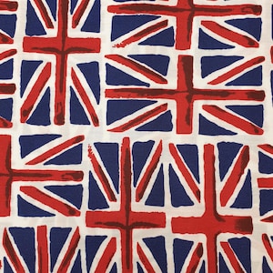 May include: A white fabric with a repeating pattern of red, white and blue Union Jack flags. The flags are stylised and have a hand-painted look.