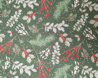 May include: Dark green fabric featuring a festive Christmas pattern. The design includes sprigs of holly with red berries, white berries, and evergreen branches. Small white dots are scattered across the fabric.
