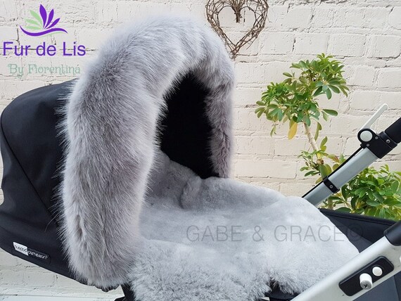 grey pram with fur